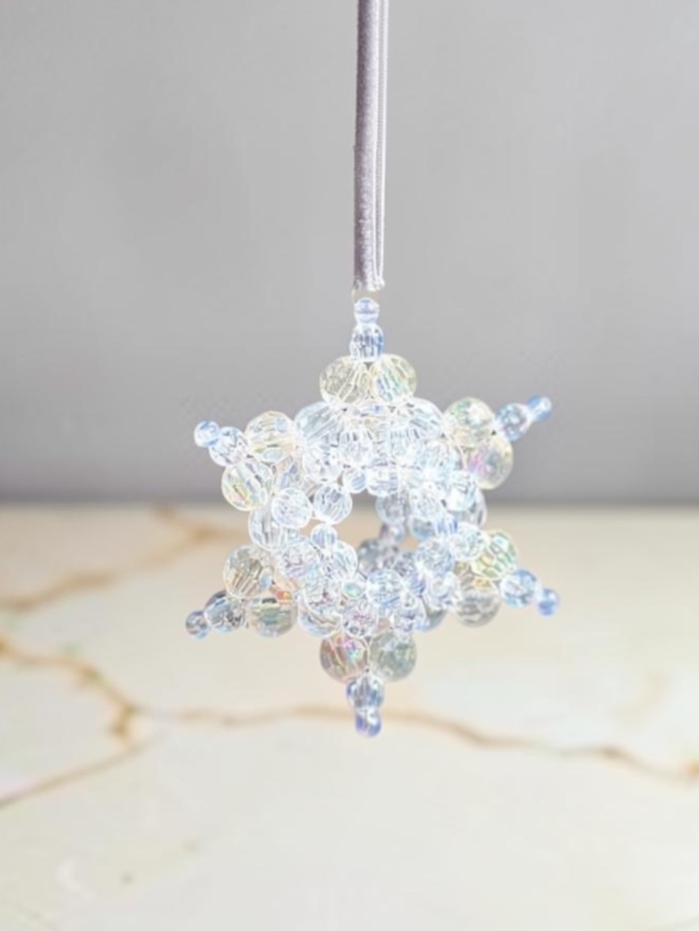 Wild Violet “Snowlight” Handmade Beaded Star Ornament on Velvet Ribbon